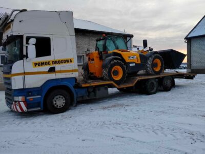 Transport maszyn rolniczych budowlanych pomoc drogowa