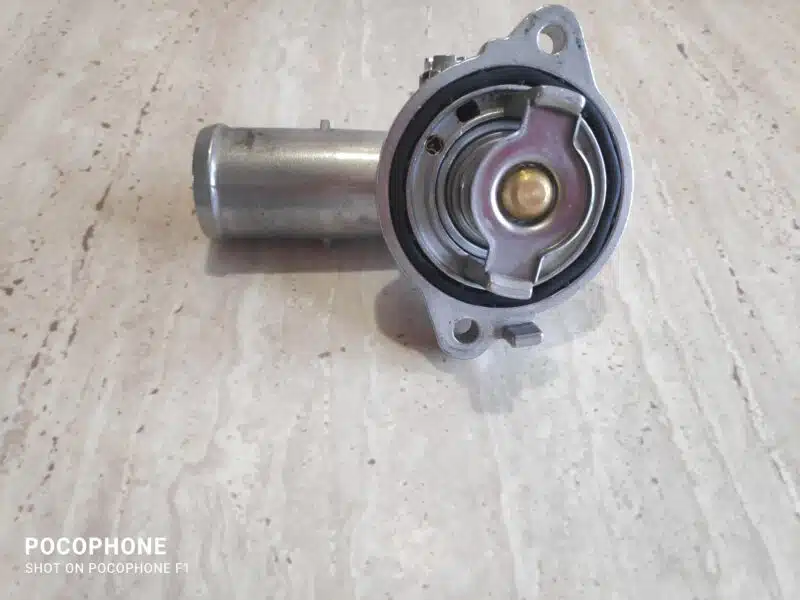 Nowy Termostat 95C Króciec aluminiowy Pentastar 3,6l Durango, WK2