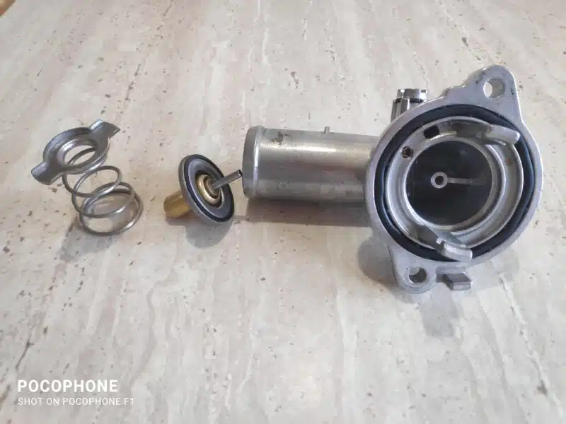 Nowy Termostat 95C Króciec aluminiowy Pentastar 3,6l Durango, WK2