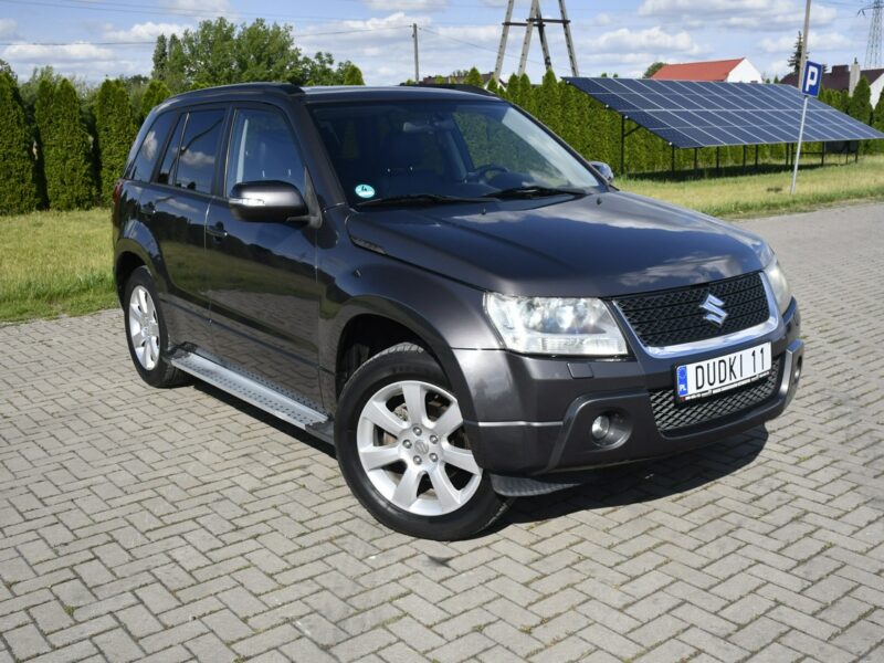 Suzuki Grand Vitara 2,4B DUDKI11 Automat,Hands-Free,4x4,Xenony,Szyberdach,El.szyby.kredyt. II (2005-2015)