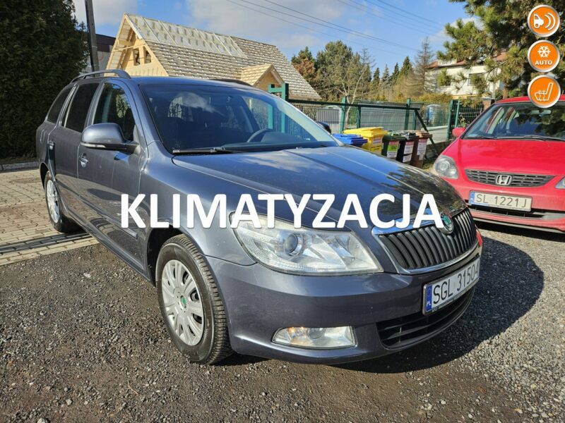 Škoda Octavia Klimatronic dwu strefowy / Podgrzewane fotele / Tempomat II (2004-2013)